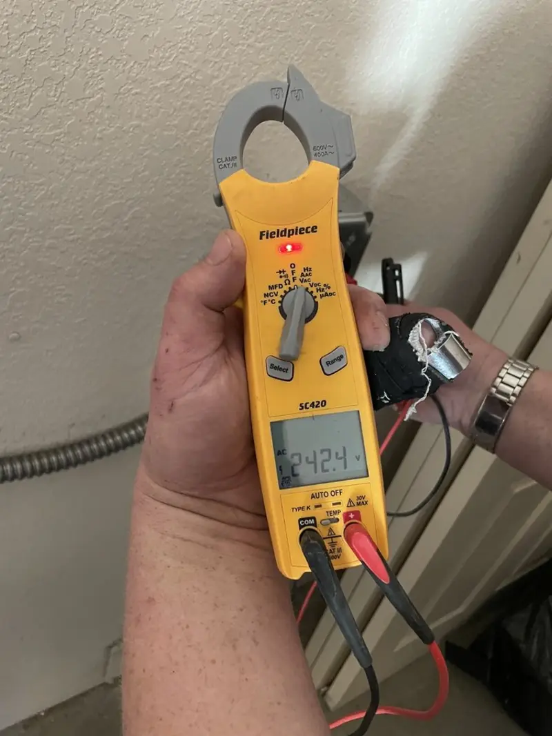 Voltage testing with clamp meter during Electrical Installation Services in South Highpoint